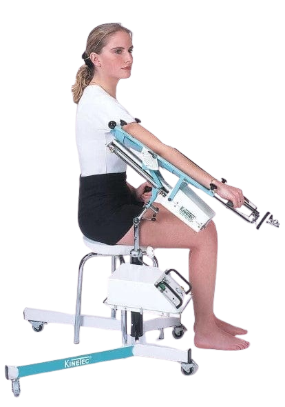 Woman In The Seated Position Side View Using The Kinetec 6080 Elbow CPM Machine