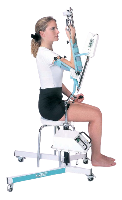 Woman In The Seated Position Side View Using The Kinetec 6080 Elbow CPM Machine