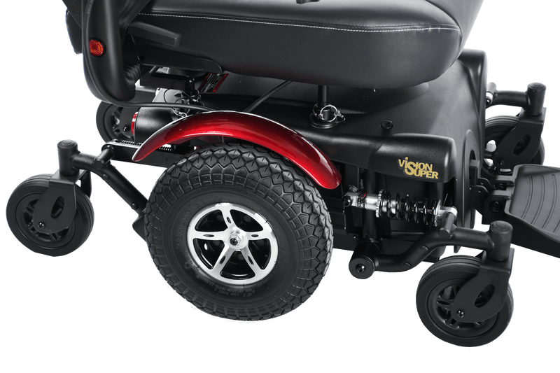Close Up Right Side View Of The Merits Vision Super Heavy Duty Power Chair In Red Color