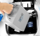 Close Up View Of A Person Removing The Batteries For The Tzora Titan 4 Hummer Medical Mobility Scooter