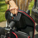 Close Up View Of Feather Mobility Scooter Front Handle With Woman Holding It