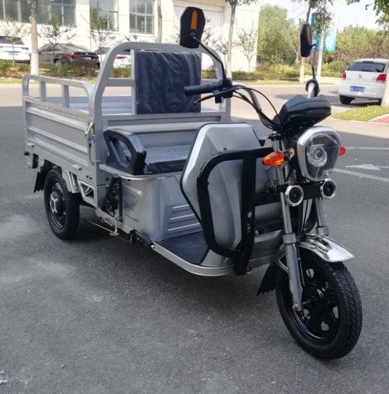 Front Right Side View Of The PET Electric Cargo Truck Shown In An Outdoor Setting