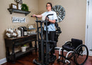 Front View Of The EasyStand Glider Large Active Standing Frame Shown With Woman Using The Device In A Home Setting