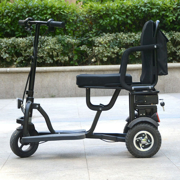 Left Side View Of The MotoTec Folding Mobility Electric Trike 48v 700w Dual Motor Lithium Shown In An Outdoor Setting