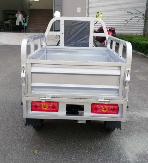 Rear Centered View Of The PET Electric Cargo Truck Shown In An Outdoor Setting