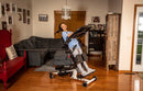 Side View Of The EasyStand Bantam Medium Standing Frame Shown With Girl Using Device In The Supine Position In A Home Setting