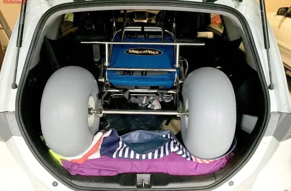 Wheeleez Sandcruiser All-Terrain Beach Wheelchair Mediterranean Blue Color Inside The Trunk Of A Car.